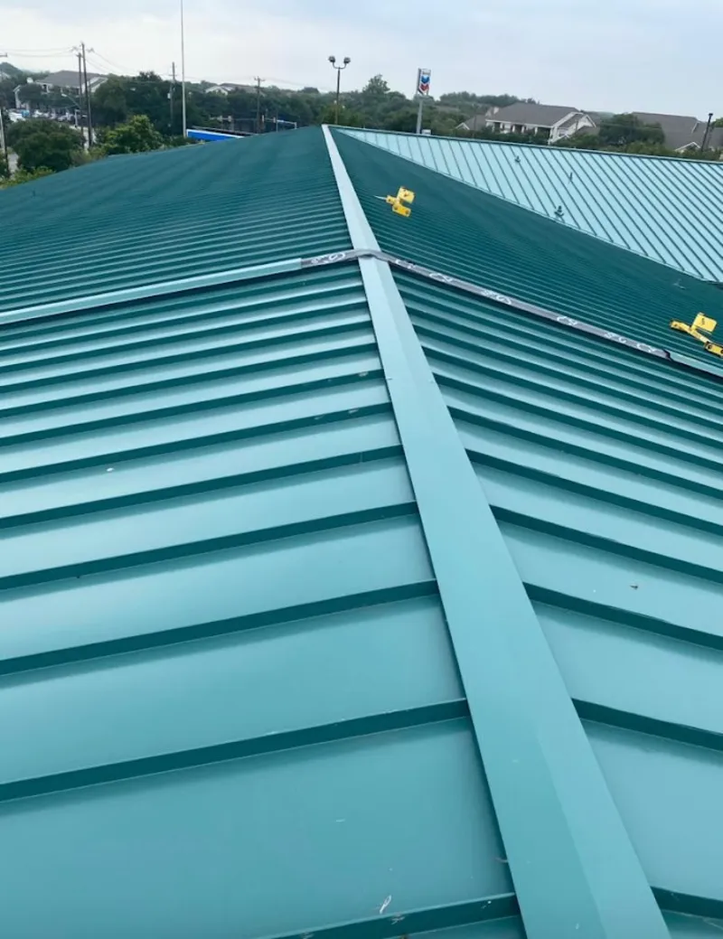 Green commercial metal roof ridge and valley for Metal Roof Repair in Egelston