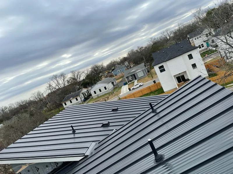 Standing seam metal roof panels with vents for Skylight Repair in Egelston